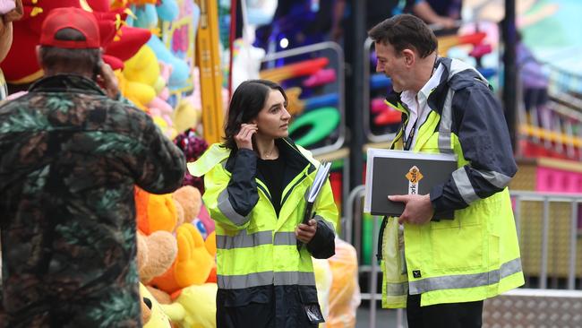 WorkSafe officers at the Rebel Coaster on Monday. Picture: Brendan Beckett