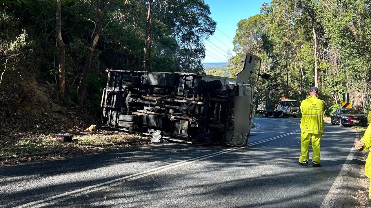 Police closed off Doonan Rd following a truck rollover, with one person taken to hospital with neck pain. Picture: Contributed