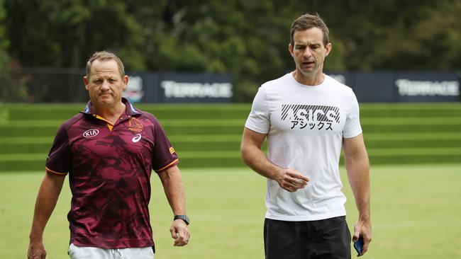 Broncos coach Kevin Walters and CEO Dave Donaghy gave Hynes a tour of Red Hill. Pic Annette Dew