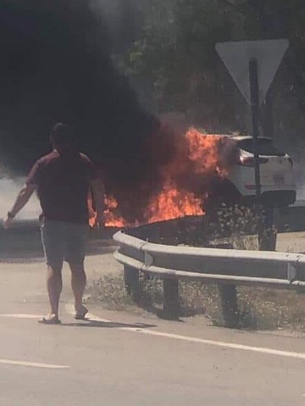 A man inspects the fire at Thuringowa Dr. Photo: Facebook