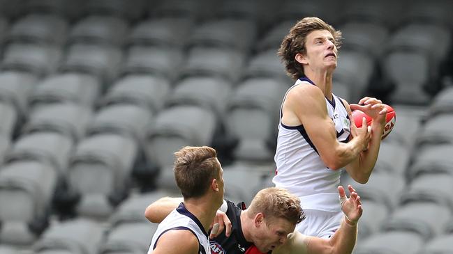 Sam Sturt soars for a mark in Round 1 against Essendon.