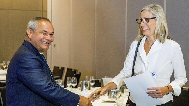 Tom Tate shakes hands with Mona Hecke. Picture: Jerad Williams