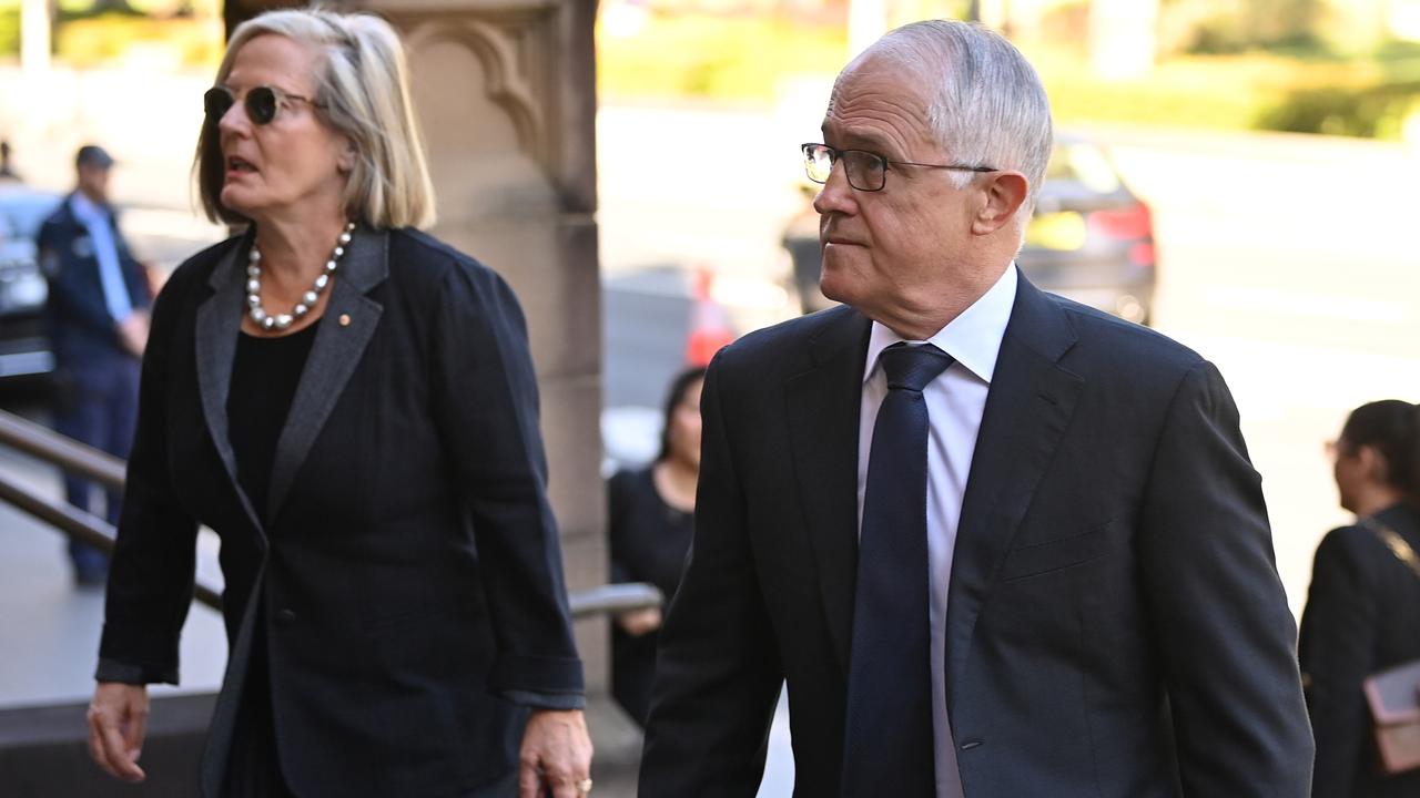 Malcolm Turnbull (right) and Lucy Turnbull arrive. Picture: NCA NewsWire/Joel Carrett