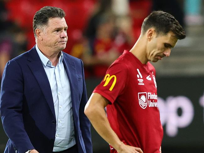 ADELAIDE, AUSTRALIA - FEBRUARY 15: Carl Veart United coach and Isaias of Adelaide United reacts after the 1-2 loss during the round 19 A-League Men match between Adelaide United and Newcastle Jets at Coopers Stadium, on February 15, 2025, in Adelaide, Australia. (Photo by Sarah Reed/Getty Images)