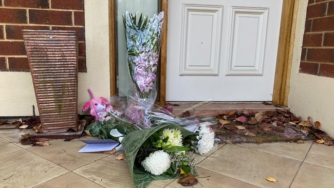 Flowers outside the home of Ann Marie Smith. Picture: Gabriel Polychronis