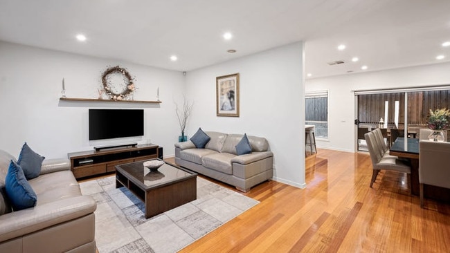 Tasmanian Oak timber floors in the open plan living and dining area, where the family enjoys spending time together.