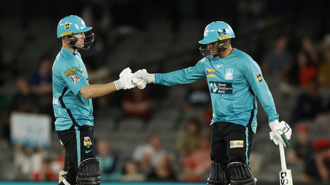 Marnus Labuschagne (left) and Usman Khawaja will bolster the Brisbane Heat in a three-game cameo as they fight for finals qualification. Picture: Jonathan DiMaggio / Getty Images