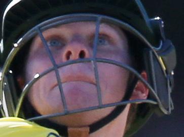 Australia's Steve Smith hits the ball while batting against India during their Cricket World Cup semifinal in Sydney, Australia, Thursday, March 26, 2015. (AP Photo/Rick Rycroft)