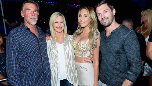 (L-R) John Easterling and Olivia Newton-John, Chloe Lattanzi and her partner James Driskill on August 9, 2015 in Las Vegas. Picture: Bryan Steffy