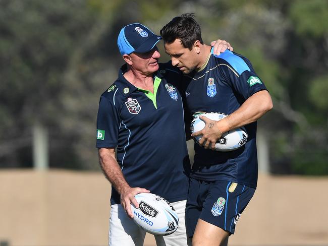 Blues adviser Peter Stirling speaks with Mitchell Pearce during NSW training at Cudgen. Picture: AAP