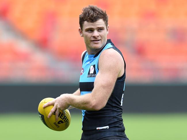 Greater Western Sydney Giants AFL player Heath Shaw takes part in a training session in Sydney on Wednesday, Sept. 21, 2016. The Giants are preparing for their AFL Preliminary Final showdown with Western Bulldogs on Saturday night. (AAP Image/Paul Miller) NO ARCHIVING