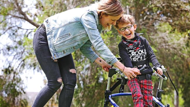 Bianca Bartlett enjoys the sunshine with her son Ace, 4, who is getting help for symptoms of Aicardi-Goutieres Syndrome at the Cerebral Palsy Education Centre. Picture: Tim Carrafa