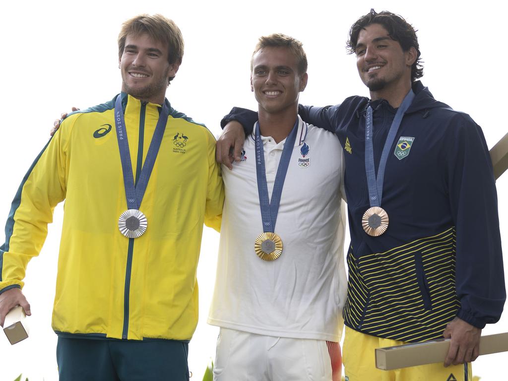 Men’s surfing silver medallist Jack Robinson, French gold medallist Kauli Vaast and bronze medallist Brazil’s Gabriel Medina. Picture: Sean M. Haffey/Getty Images