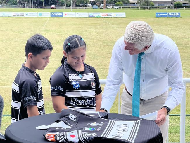 Member for Tweed Geoff Provest showing young Tweed Seagulls siblings Kahu and Harmony Jacobs the new plans.