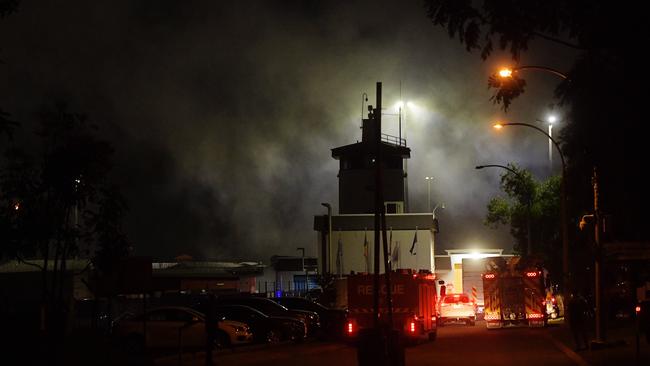 Smoke pours from inside the Don Dale centre after parts of the facility were set alight during a riot. Picture: Keri Megelus