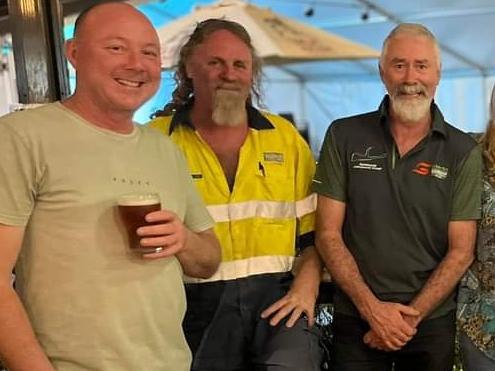 Peter Desalis (middle) loved his job at the wharves in Darwin. Photo: Supplied