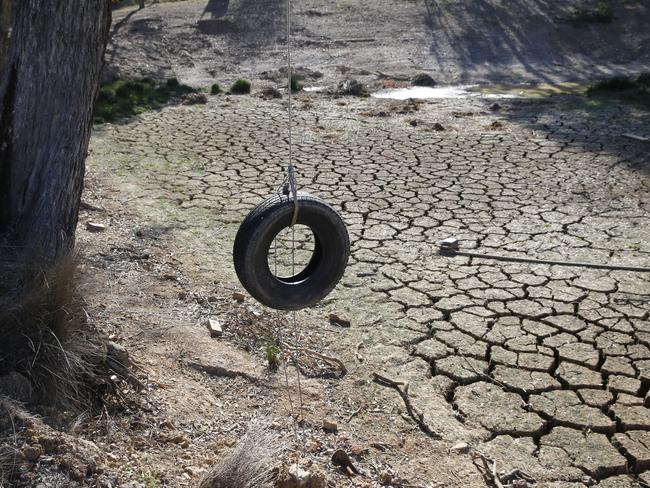 The family’s dam is dry and cracked. Picture: AAP Image/David Swift