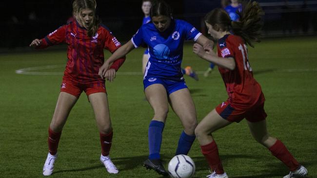 The match between Football SA and Modbury Vista was a tussle to begin with, but FSA soon gained the ascendancy. Picture: Emma Brasier