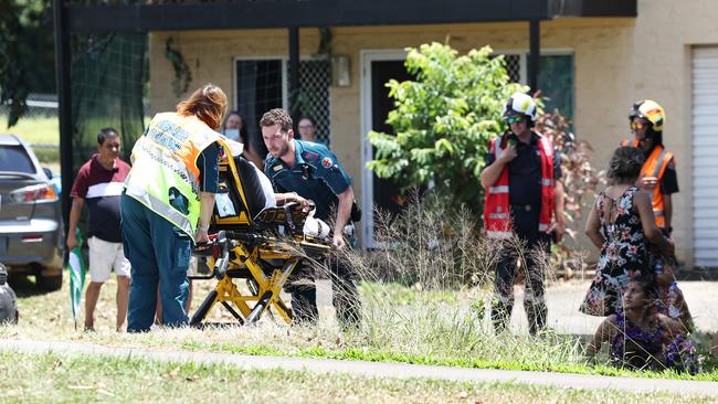 Emergency services personnel respond to a collision between a small car and a cane train at a level crossing on Beatrice Street, Mooroobool. Three occupants of the car were treat at the scene by paramedics before being transported to hospital with minor injuries. Picture: Brendan Radke