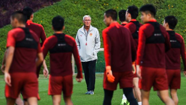 China's national team coach Marcello Lippi speaks to his players ahead of the Asian Cup. Picture: AFP