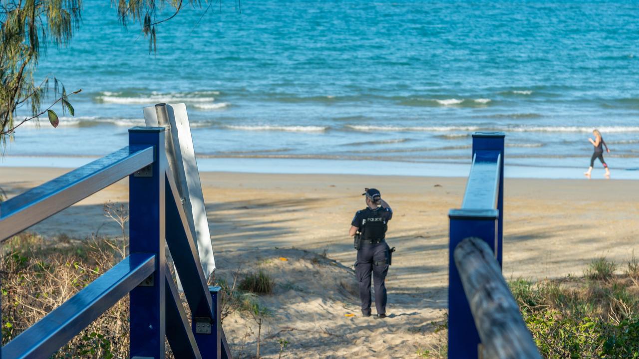 Police at Blacks Beach after the stabbing attack. Photo: Daryl Wright