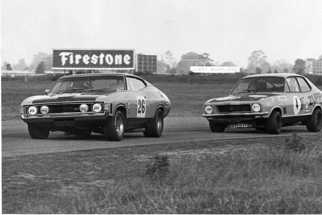 SURFERS Paradise international raceway file pic sept 1973 John French in the Ford falcon Hardtop, Dick Johnson (R) in Holden Torana. sport motor racing action qld