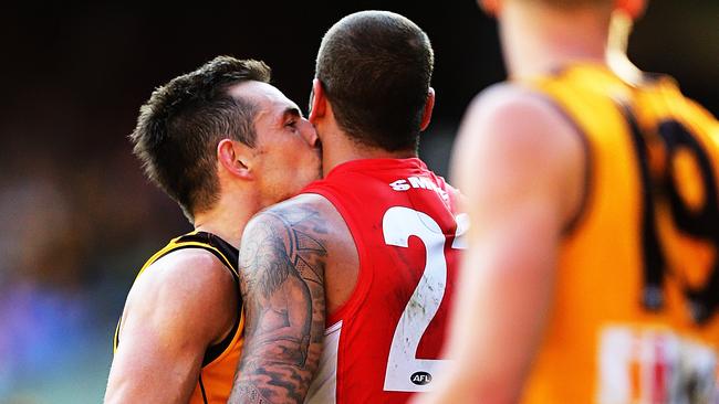 2014 AFL Grand Final match between Hawthorn Hawks and the Sydney Swans at the MCG Melbourne Cricket Ground on September 27, 2014. AFLGF2014. Luke Hodge gives his old team mate a kiss (kiss of death). Picture: Tim Carrafa