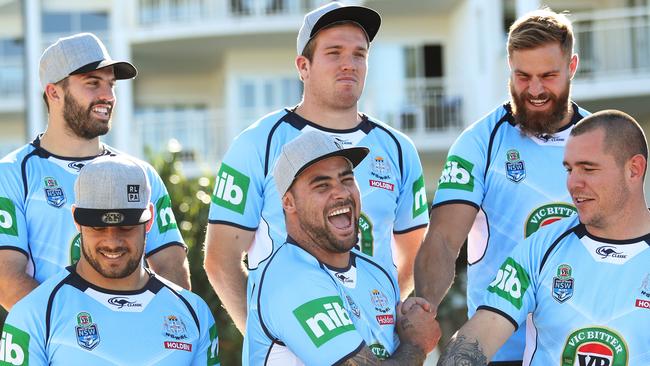 NSW players wearing RLPA caps during a team photo shoot at their camp in Kingscliff on Tuesday.