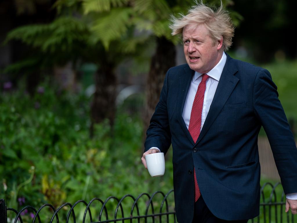 Boris Johnson taking a walk on his way to work. Picture: Chris J Ratcliffe/Getty Images.