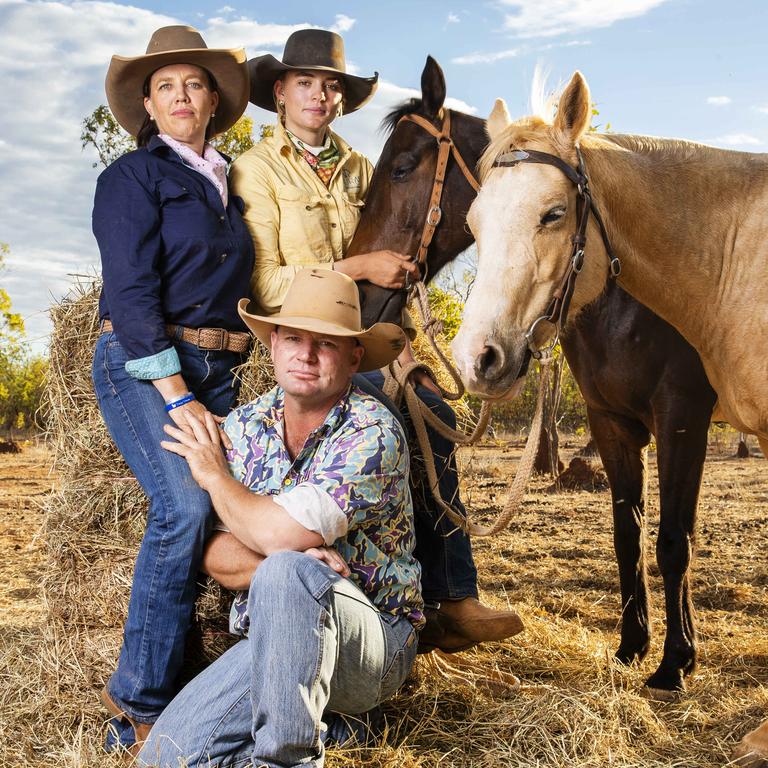 Kate and Tick Everett with daughter Meg and their horses at home on the family property near Katherine. Picture: Lachie Millard