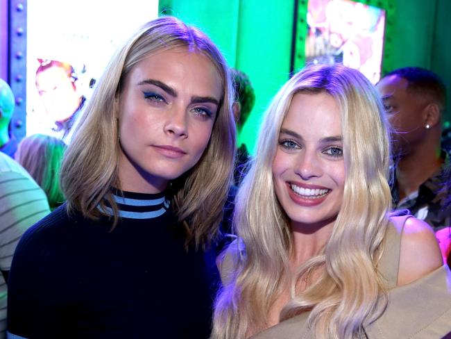 Cara Delevingne and Margot Robbie of 'Suicide Squad' attend the Samsung Experience at San Diego Comic-Con 2016. Picture: Getty Images