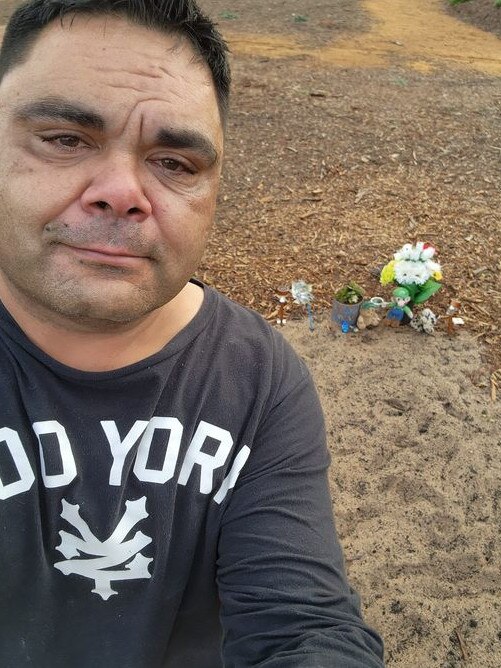 Shane Wanganeen at the gravesite of his son Makai. Picture: Supplied