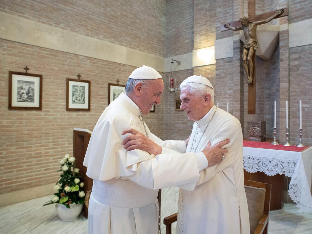 Pope Francis (left) said that former pontiff Benedict XVI, 95, (right) is "very ill". Picture: AFP.