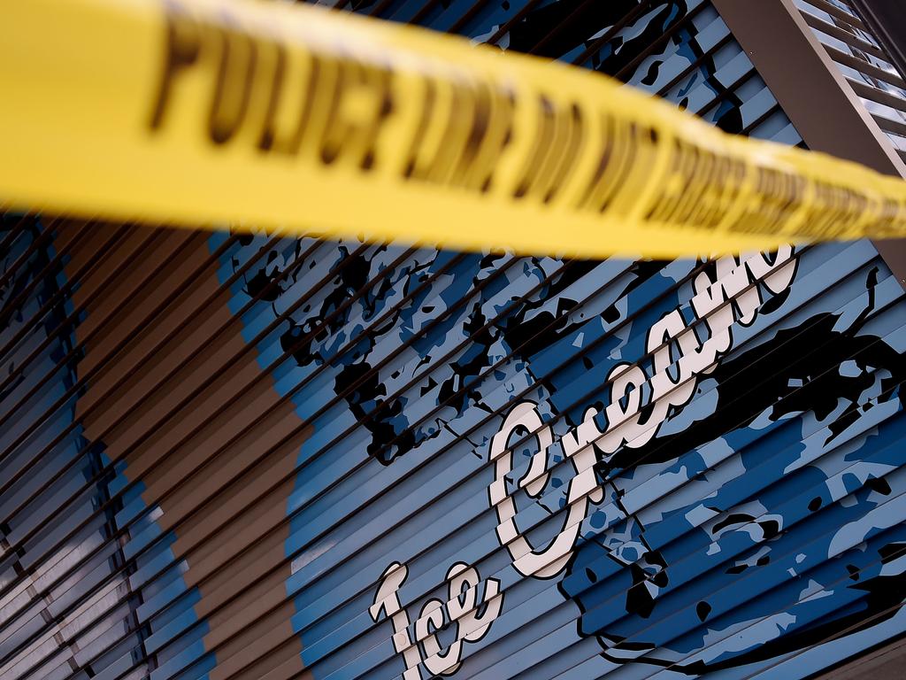 A taped up ice cream shop in Washington DC. Picture: Olivier DOULIERY / AFP.