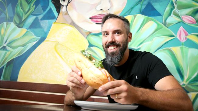 Lyndon Tyers, head chef at Donna Chang in Brisbane City, at his favourite takeaway restaurant, Cafe O-mai in Annerley. Picture: Steve Pohlner