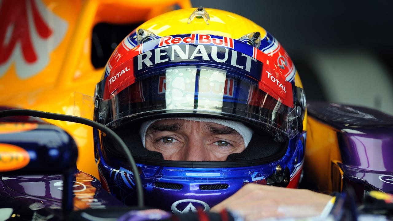 Australian F1 driver Mark Webber prepares to take his Red Bull car out on the first practice session at the Australian Grand Prix circuit, Friday, March 15, 2013. (AAP Image/Joe Castro) NO ARCHIVING, EDITORIAL USE ONLY