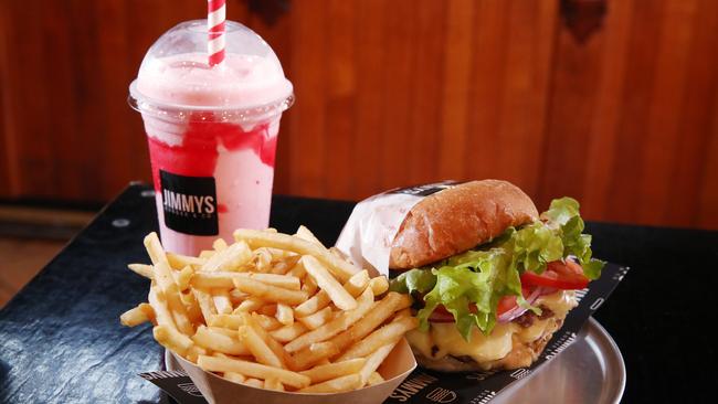 Jimmy's Burger and Co has been voted as the best burgers in Cairns by Cairns Post readers. A Jimmy's classic double patty burger, fries and a strawberry milkshake. Picture: Brendan Radke