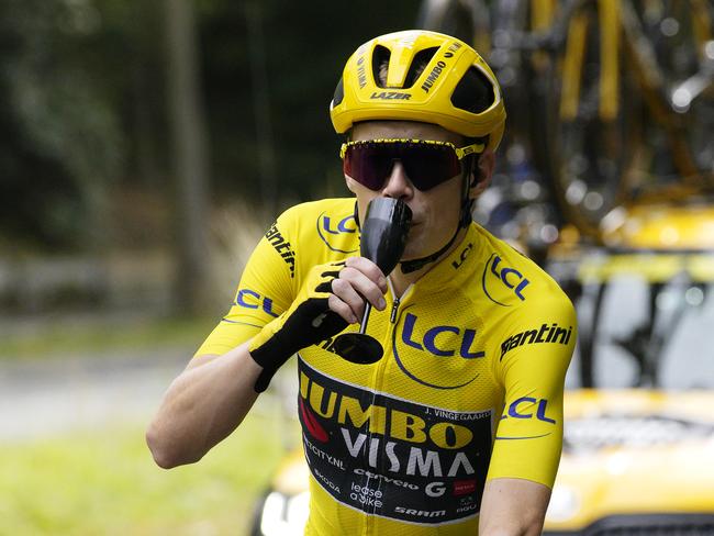 Vingegaard celebrates with champagne during the final stage of the Tour de France from Saint-Quentin-en-Yvelines to Paris. Picture: Daniel Cole – Pool/Getty Images