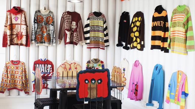 Fashion archivist Octavius La Rosa's collection of Walter Van Beirendonck sweaters hanging inside Dot Comme in Melbourne. Picture: Farfetch