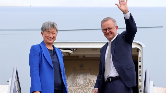 Prime Minister Anthony Albanese stands with newly appointed Foreign Minister Penny Wong before travelling to Japan to attend the Quad Leaders' meeting in Tokyo. Picture: David Gray/Getty Images