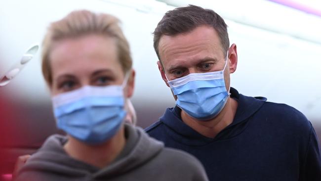 Alexei Navalny and his wife Yulia are seen in a Pobeda plane heading from Berlin to Moscow on January 17, where Navaly knew he faced imminent arrest. Picture: Kirill Kudryavstev/AFP