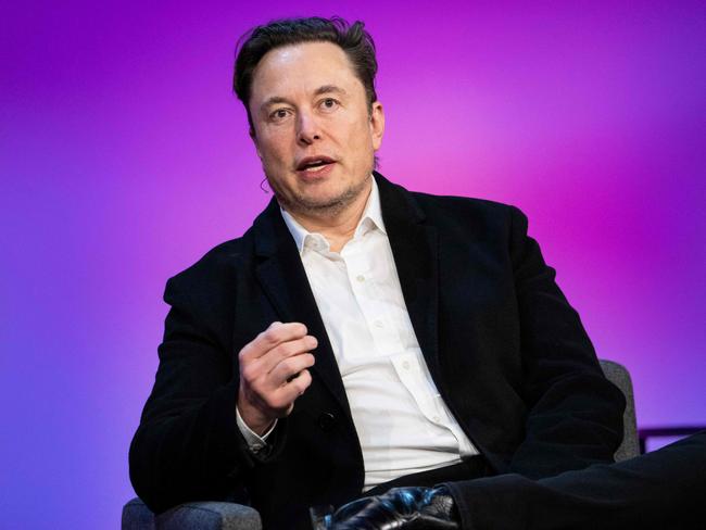 This handout image released by TED Conferences shows Tesla chief Elon Musk speaking during an interview with head of TED Chris Anderson (out of frame) at the TED2022: A New Era conference in Vancouver, Canada, April 14, 2022. (Photo by Ryan Lash / TED Conferences, LLC / AFP) / RESTRICTED TO EDITORIAL USE - MANDATORY CREDIT 