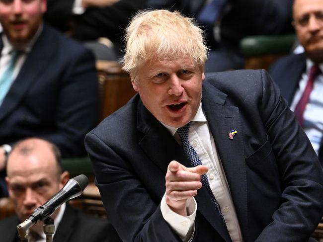 A handout photograph released by the UK Parliament shows Britain's Prime Minister Boris Johnson speaking during the first day of a debate on the Queen's Speech, in the House of Commons, in London, on May 10, 2022. (Photo by JESSICA TAYLOR / various sources / AFP) / RESTRICTED TO EDITORIAL USE - NO USE FOR ENTERTAINMENT, SATIRICAL, ADVERTISING PURPOSES - MANDATORY CREDIT " AFP PHOTO / Jessica Taylor /UK Parliament"