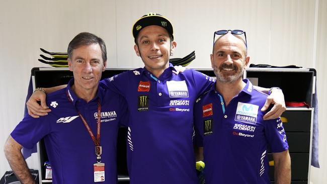 Valentino Rossi marks his contract extension with Yamaha MotoGP bosses Lin Jarvis and Massimo Meregalli. Pic: Yamaha.