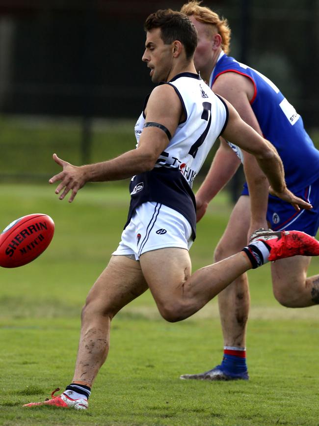 Sam Lloyd in action for Bundoora. Picture: Stuart Milligan