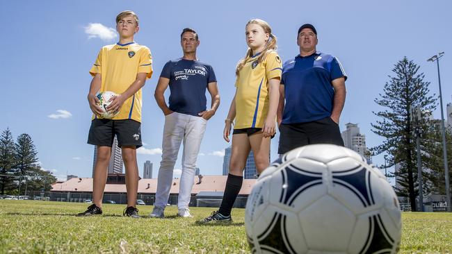 Ethan Long, 16, Division 10 candidate Darren Taylor, Indiana McDonald, 10, and Broadbeach Soccer Club Juniors director Campbell Black. Picture: Jerad Williams