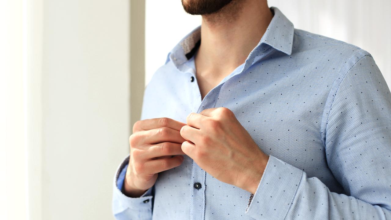 Why men's and women's shirt buttons on different sides