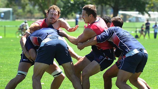 Melbourne Rebels training.Captain Scott Higginbotham (on left with moustache) Photo: Ellen Smith