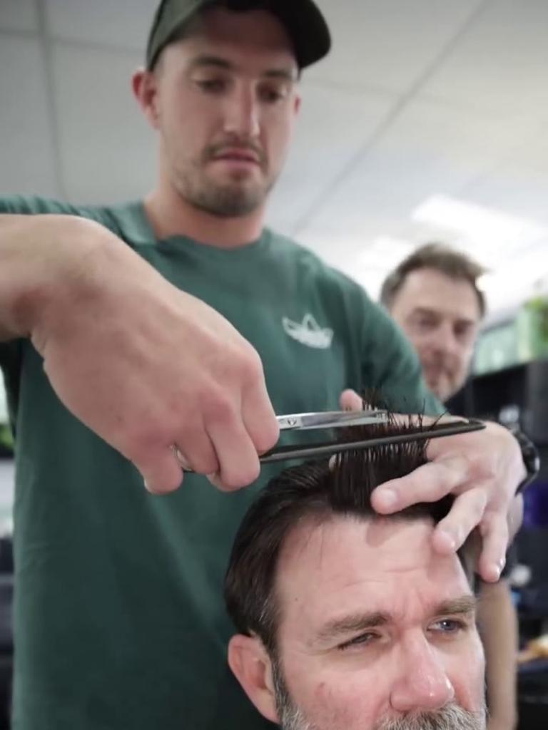 Corey Oates cutting KIIS97.3 co-host Kip Wightman’s hair. Photo: Instagram.