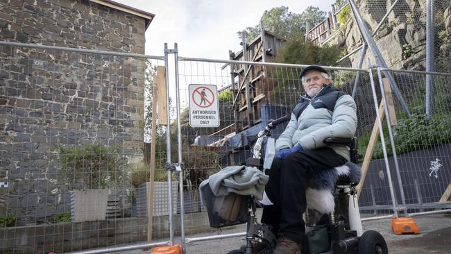 Salamanca Arts Centre board member Ian Broinowski in front of the historic coal shaft used for the old jam factory at Salamanca Square. Picture: Chris Kidd